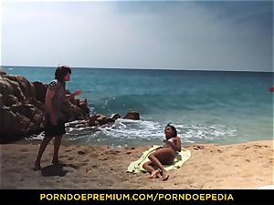 PORNDOE PEDIA jaw-dropping ebony honey beach romp tutorial